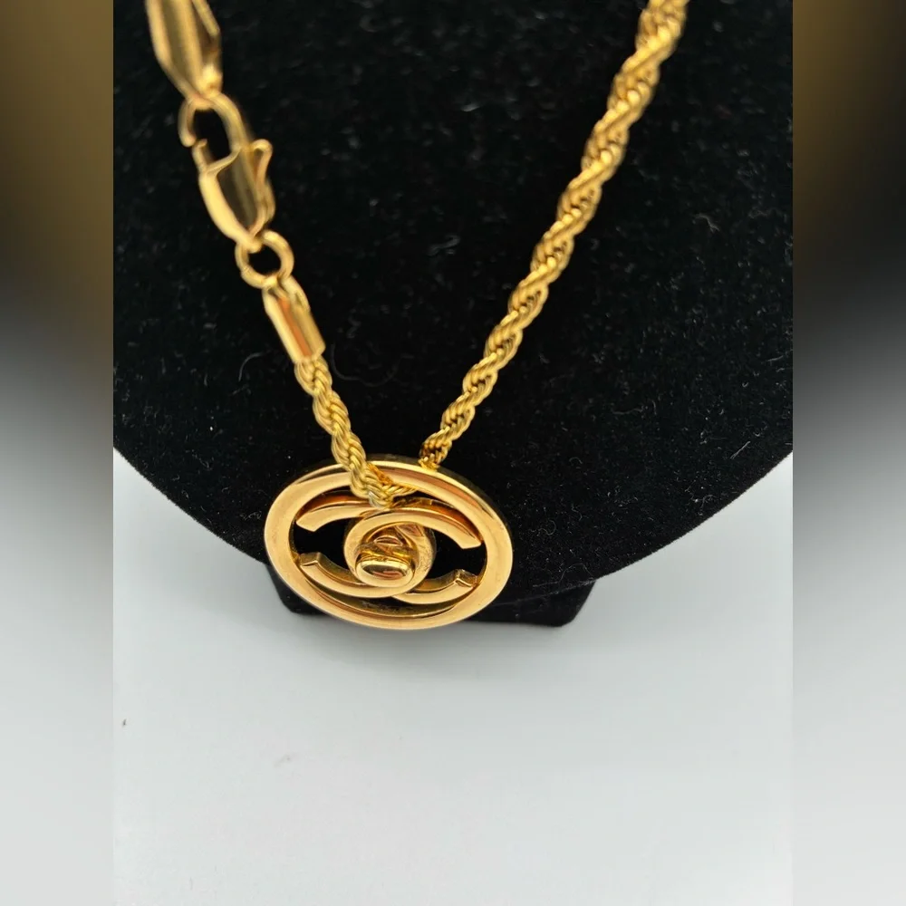 Chanel Gold-Tone CC turn lock Pendant necklace